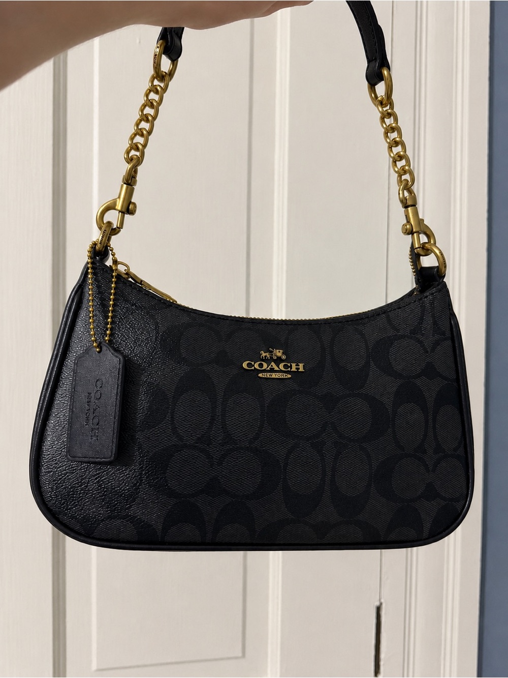 Coach Black Signature Canvas Shoulder Bag with Gold Hardware Accents